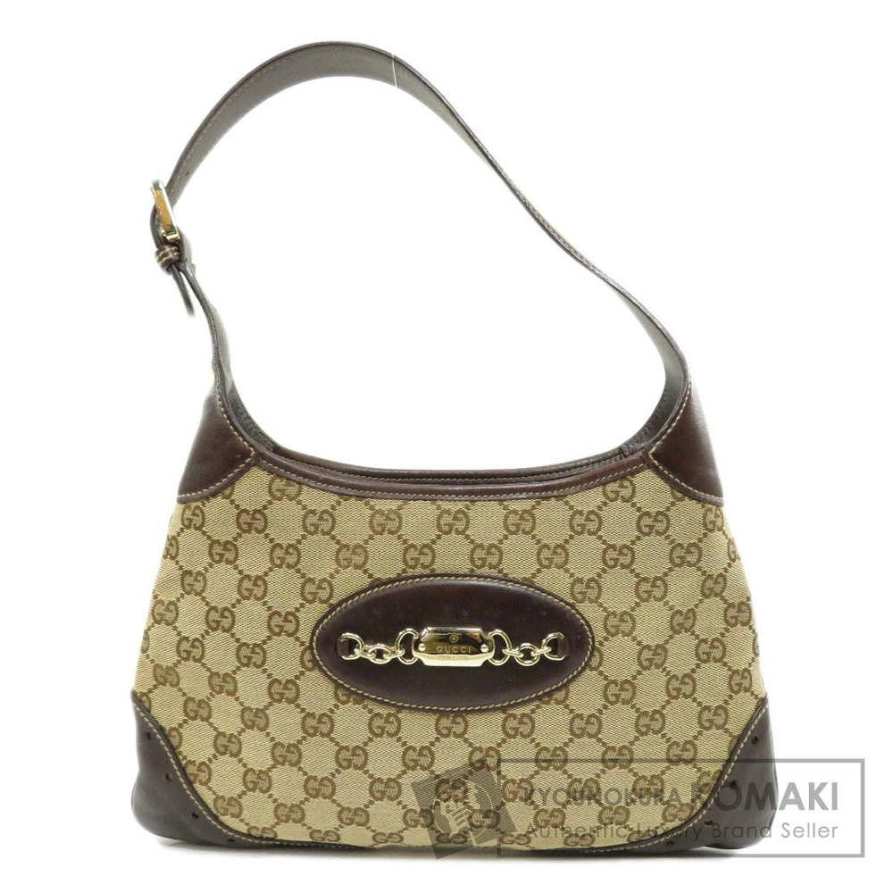 Gucci GG Canvas Punch Hobo bag brown leather
